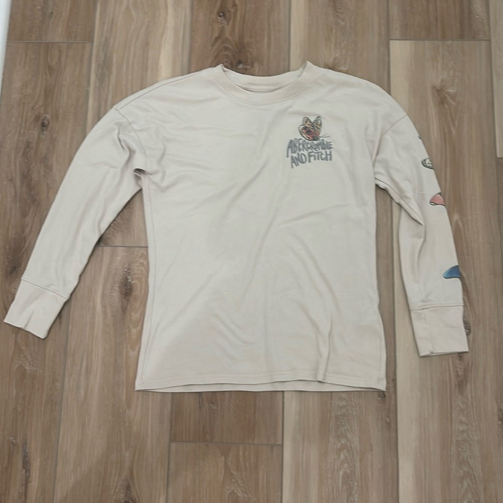 Abercrombie Kids Cream Long Sleeve Tee with Graphic Design